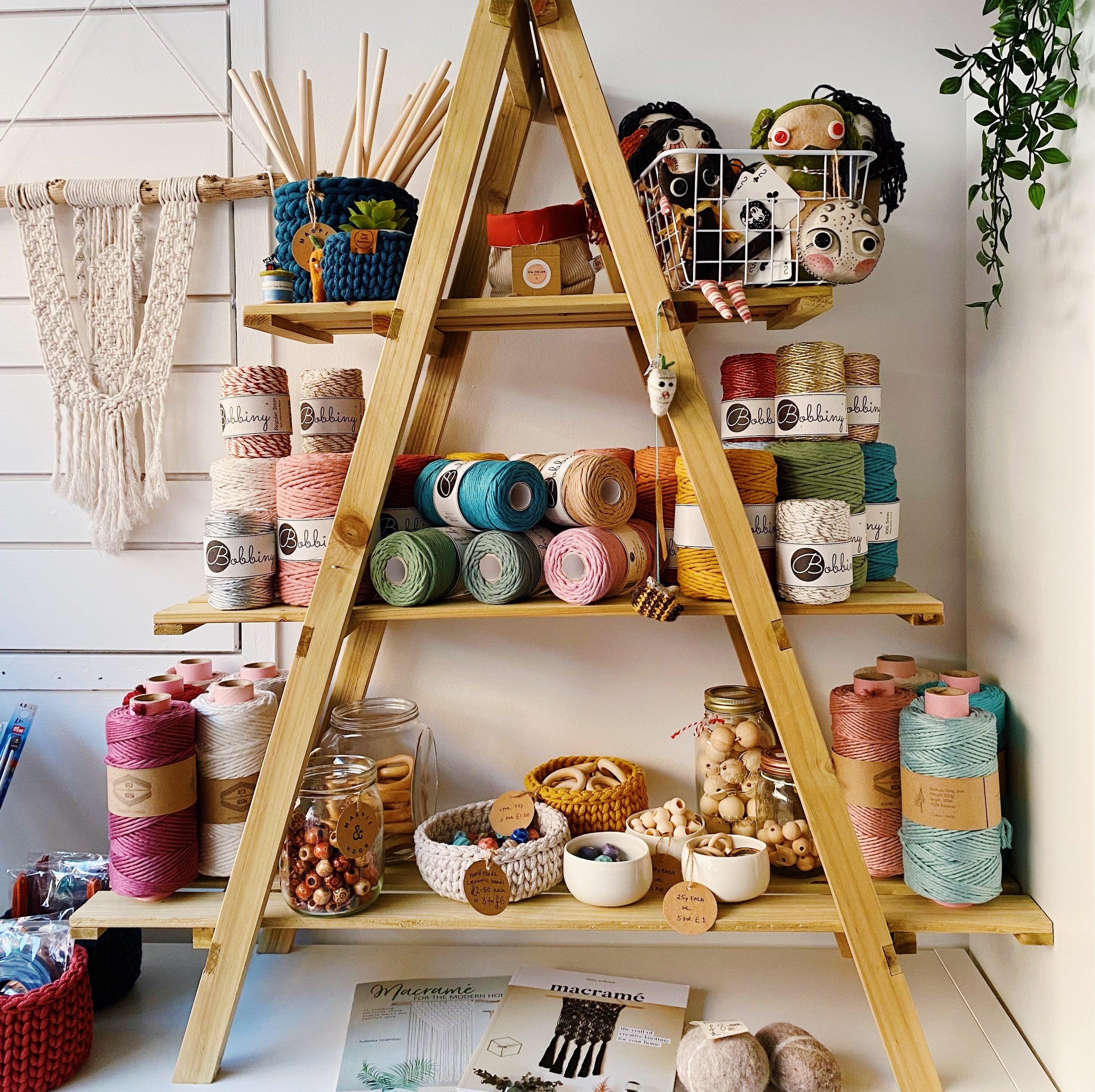 A range of haberdashery items displayed in a shop interior at Magpie and Hook